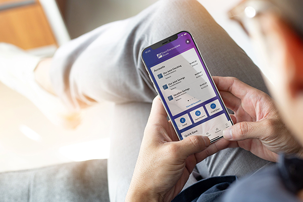 User reviewing savings account balance and recent activity in First Foundation’s banking app